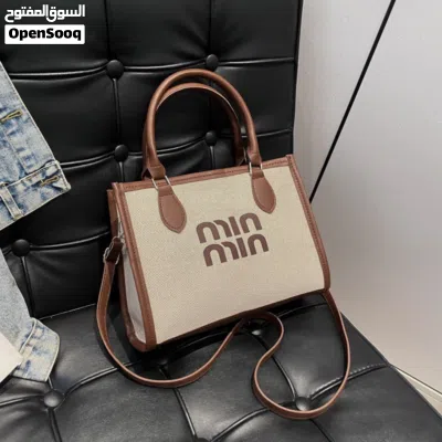 حقيبه حجم وسط min min اغلاق سحاب 4
