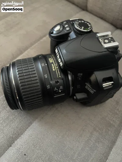 مع عدستان و ترايبود وملحقات اخرى Nikon D3100 3