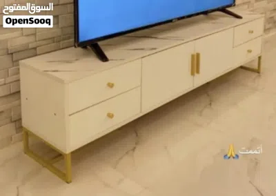 طاوله تلفزيون بحاله ممتازه 4