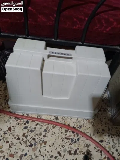 مكينه الخياطه 4