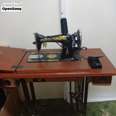 ماكينه خياطه ملابس نوع سنجر بحاله ممتازه بسعر مغري 50 قابل للتفاوض 3