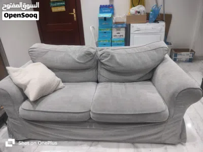 Ikea sofa well maintained with extra sofa cover 2