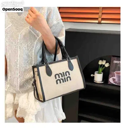 حقيبه حجم وسط min min اغلاق سحاب 2