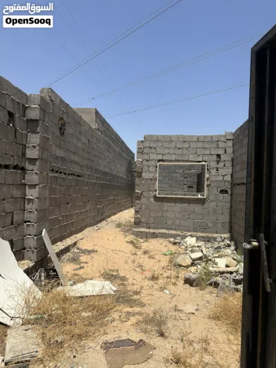 قطعة ارض في وادي الربيع عليها هيكل 2