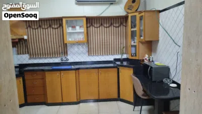 شقة طابق اول في عمارة مكونة من طابقين 3