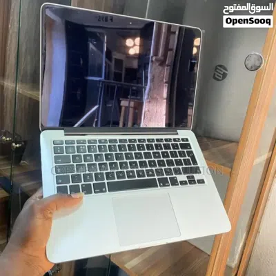 ماك بوك برو i7 مديل 2015 شاشه 15.6 2