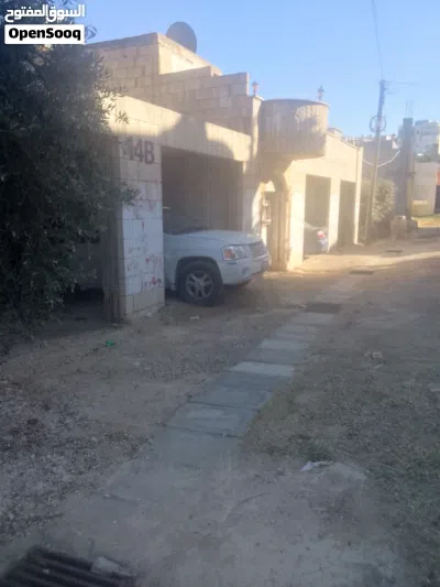 بيت طابق اول مع تسوية خمس شقق مع اربع مخازن 3