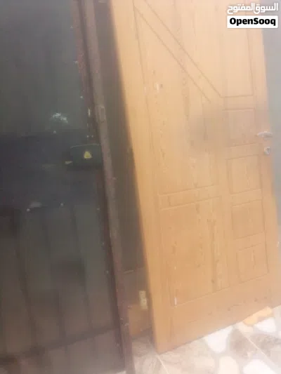 أبواب لوح خارجي وبابين داخليات وباب حديد شبه جديد في تاجوراء 2