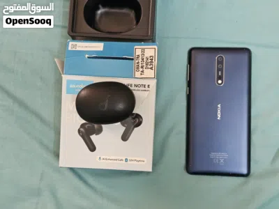 Nokia 8 phone with Bluetooth earphones 4