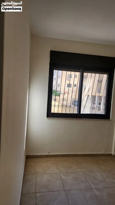 شقة للايجار غير مفروشة ضاحية الريحان 4