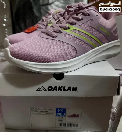 Textured lace-up sport shoes with cushioning. Contrasting toned panel details. 3