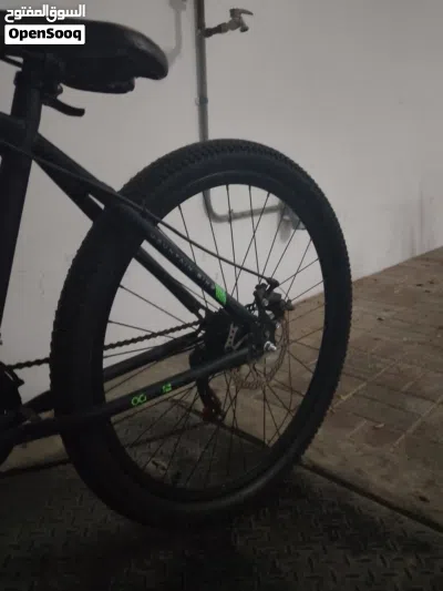 {CHEAP BICYCLE} UPOK UK MOUNTAIN BIKE PRICE 32.5 OMR GOOD CONDITION NEGOTIABLE 3