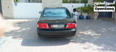 كيا اوبتيما Standard 3