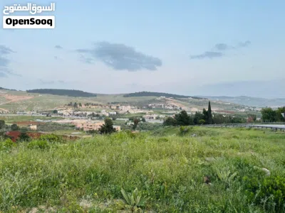قطعه ارض للبيع في جرش طريق اربد عمان واجهه على الشارع 65 م تجاري 3