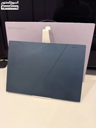ASUS Zenbook 14 OLED (Ultra 9) شبه جديد مع ملحقاته واستخدام خفيف 4
