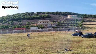 قطعة أرض مفروزة وبقوشان مستقبل تنظيم ب 2