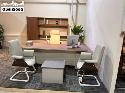 modern executive L-shaped office desk, also commonly referred to as a boss table or CEO desk. 4
