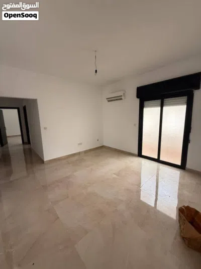 شقه للبيع في عمارات 7000 قاريونس الطابق الأرضي 4