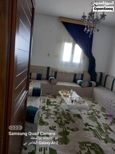 منزل دورين للبيع بضواحي الخمس منطقة الطورة بعد سوق الشعبي عاليسار طريق النهر 3