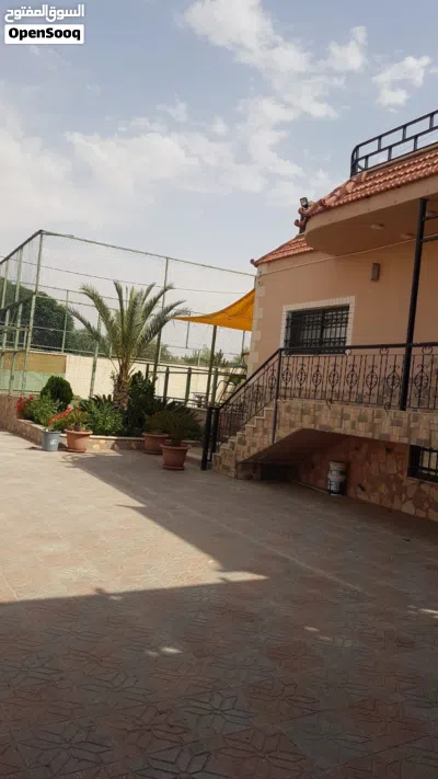 مزرعة مع فيلا للبيع في مادبا 4800 متر 3