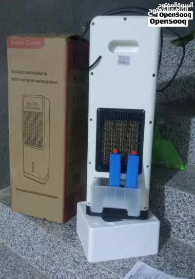 مبردة هواء حجم مكتبي مع ريمونت وكذلك تعمل باللمس مع مطارتي ثلج وتعطي هواء حار بالشتاء ماركه الماني 2