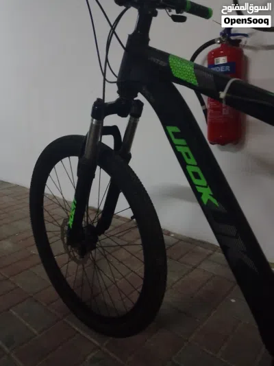 {CHEAP BICYCLE} UPOK UK MOUNTAIN BIKE PRICE 32.5 OMR GOOD CONDITION NEGOTIABLE 2