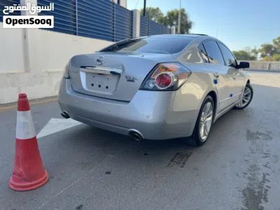 نيسان التيما SL 4