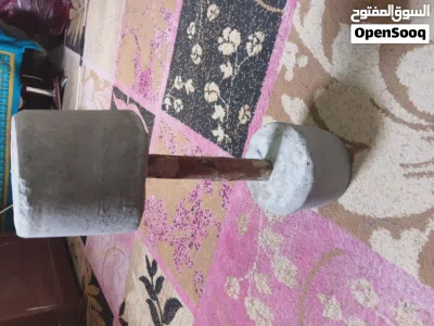 دمبل مصنوع من عصاء خشبية والاسمنت 3