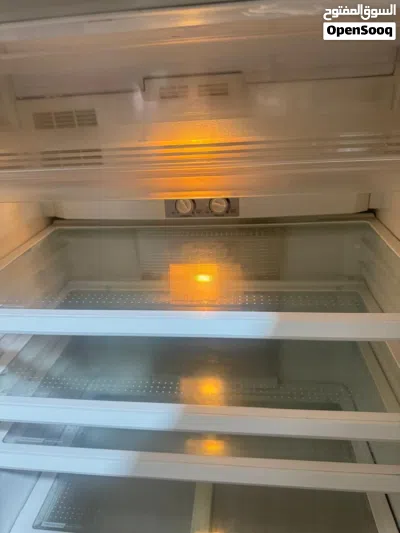 ثلاجةً شارب بحالة جيدا للبيع 4