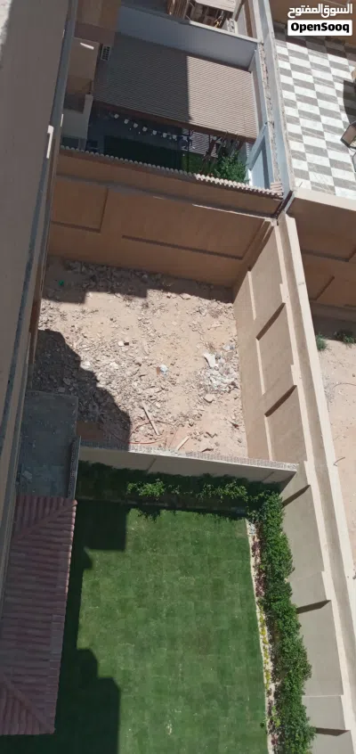 شقة أرضي بحديقة بحي المخابرات الشارع الرئيسي حدائق اكتوبر سكن مكتب عيادة حضانة 4