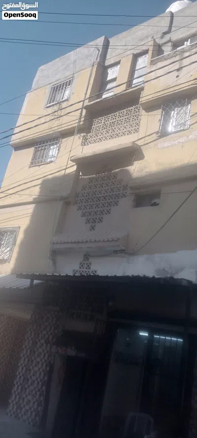 عمارة كاملة للبيع في مخيم النصر 4