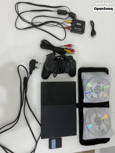 جهاز بلايستيشن 2 مستعمل مع يد تحكم و ميموري 8MB مع 34 شريط وحافظة أشرطة مع منفذ محول من AV الى hdmi 4