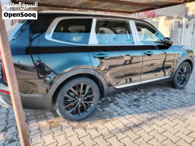 كيا تيلورايد SX 4