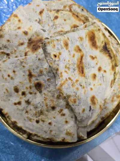 خبز صاج مهياوة بالزبدة او زيت زيتون او دهن عداني مهياوة اجار ثوم يبل مع طماط او بدون طماط كيلو 25حبة 3