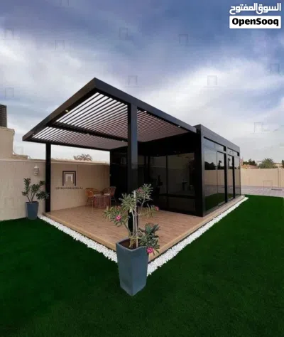 تصميم جلسات خارجية وغرف زجاجية برجولات حدائق مظلات سواتر احواض زراعيه تكسيات خشبية ديكورات حدائق 4