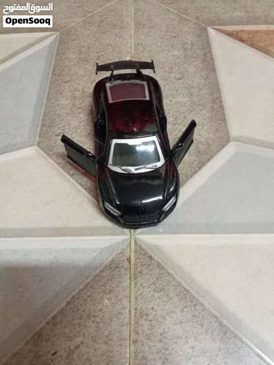 Audi Ford and JCB it so good condition and like and kids so like this cars by now it's only 5 OMR 3