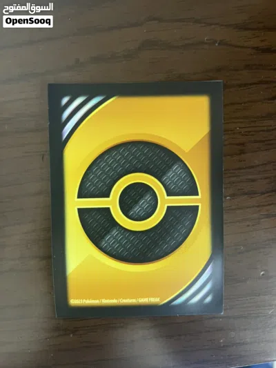 40 Assorted Pokemon Cards with 5 Gold Card Protection Sleeves 2