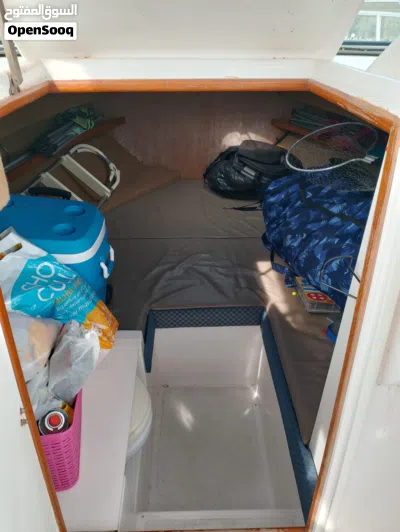 Honda Twin Engine Boat with basement Cabin - bedroom cum seating setup 4