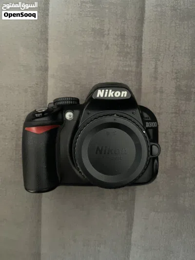 مع عدستان و ترايبود وملحقات اخرى Nikon D3100 4