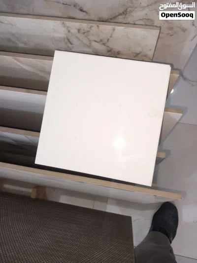 بورسلين ايطالى لون ابيض 40×40 أرضية خارجى وبوستين اسبانى 45×45 لون بيجى وارصاصى على 38 3
