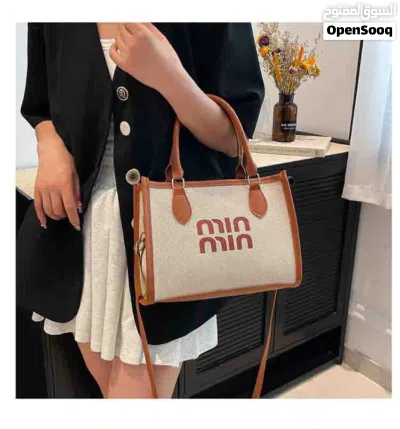 حقيبه حجم وسط min min اغلاق سحاب 3