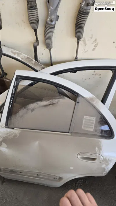 أربعة أبواب بيبان نيسان صني موديل 2012 مع كامل أغراض 4 بواب NISSAN saney 2010 3