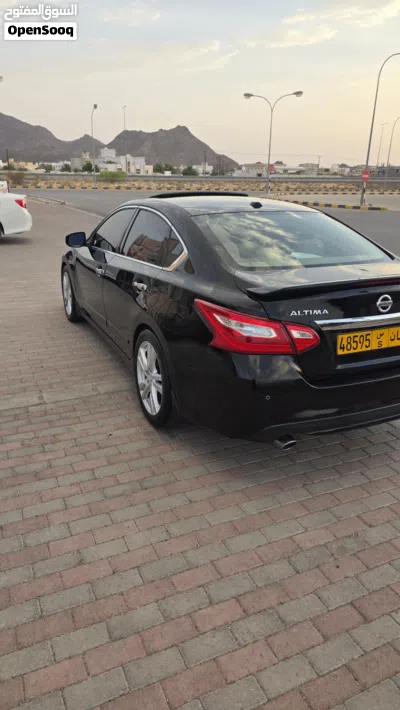 نيسان التيما SL 4