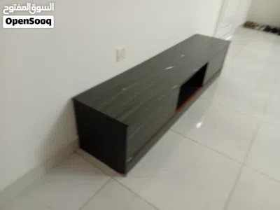 grey TV table stand moving storage and shelves طاولة تلفزيون رماديه بتخزين ورف 4