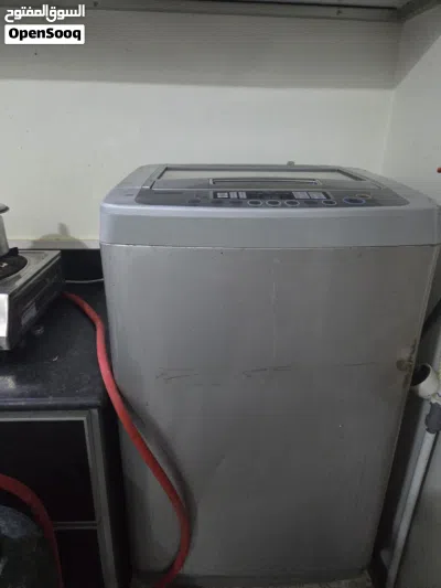 Bed with maters, cupboard, washing machine, small Fridge, TV with dish & setup box 3