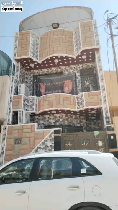 دار للبيع كربلاء حي الميلاد خلف شارع 20 قرب الحديقه الكبيره 2