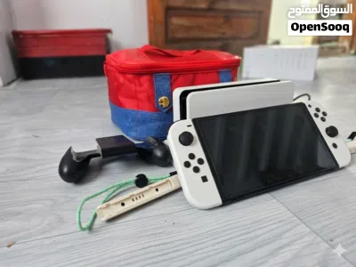 Nintendo Switch OLED مهكر (فل ألعاب + كامل الملحقات والهدايا) 3