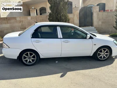 ميتسوبيشي لانسر GLX 4