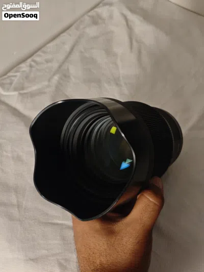 عدسة كانون سيكما ( 85mm - 1.4f ) جدا نظيفة بسعر 700 الف دينار وبي مجال 4