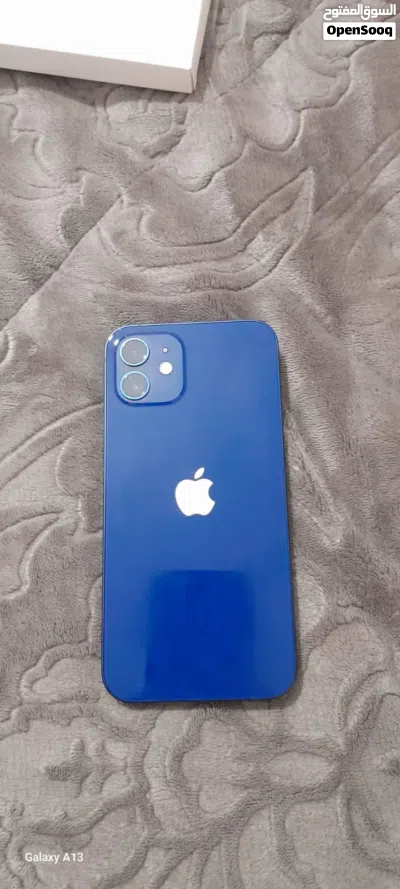 iPhone 12 وكالة مش مغير أي قطعة يدعم الشحن الاسلكي ماكسيف ويدعم شبكة 5G معاه اغراضه وملحقات 2